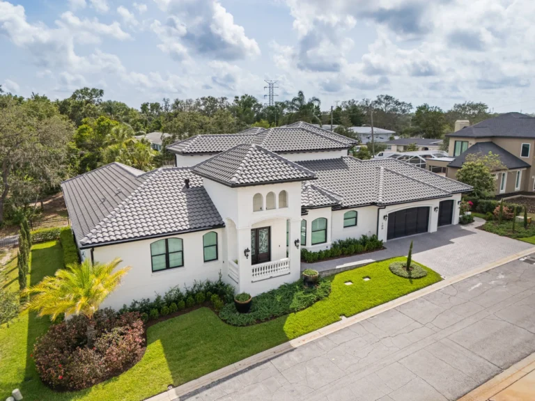 Aerial street view of a Mediterranean-style custom home built by Halo Industrial in Tampa Bay
